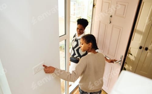 Preview: Teen girl turning off lightswitch and leaving house