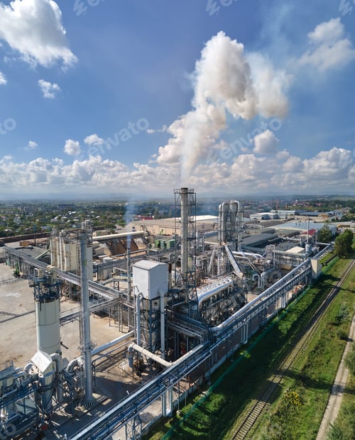 Preview: Aerial view of oil and gas refining petrochemical factory with high refinery plant manufacture