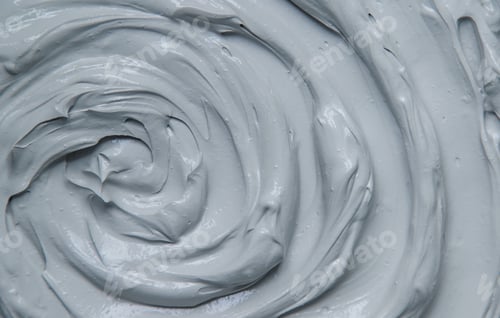 Preview: Clay texture spa mask for face and body. Selective focus.
