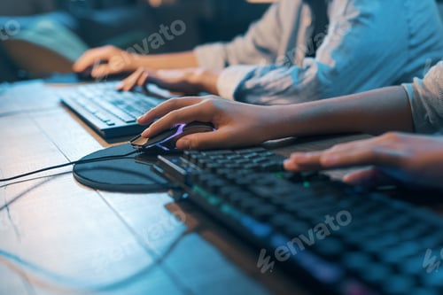 Preview: Gamers playing together hands close up
