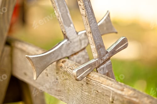 Preview: Two metal swords.