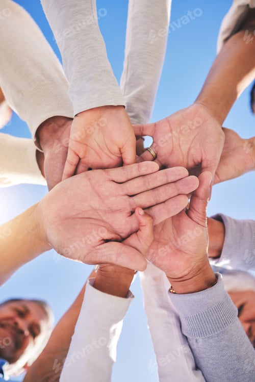 Vista previa: Stack of hands, blue sky and diversity of people for community in collaboration for global support.