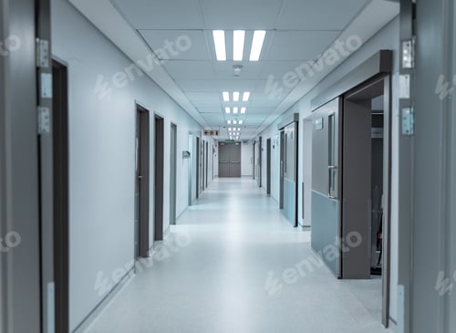 Preview: Empty, clean white corridor in modern hospital with overhead lighting, lined with doors