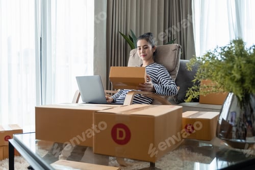 Preview: Business Start up SME concept. Young startup entrepreneur small business owner working at home