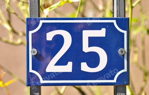 Preview: Closeup shot of a blue sign with the number 25 on the blurry background