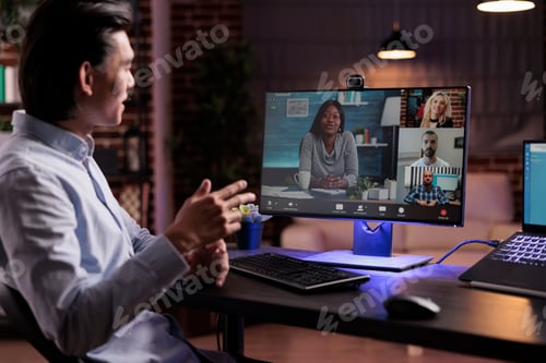 Preview: Asian employee using videocall conference