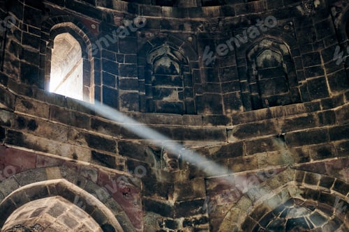 Preview: Beam of light from window of ancient indian tomb Bada Gumbad in New Delhi, India, white ray of light