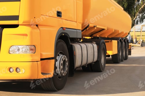 Preview: Modern yellow truck parked on country road, closeup