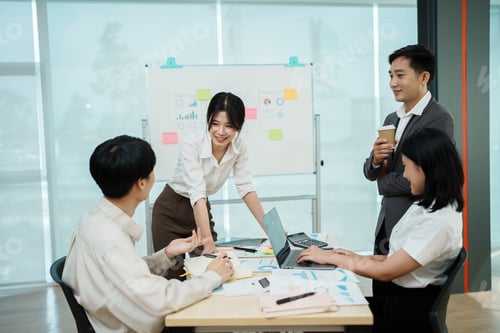 Preview: Group of Asian businessmen having a meeting in the office.