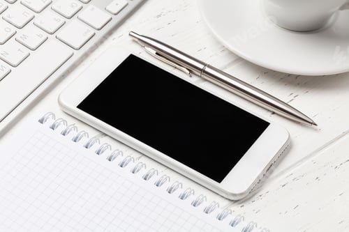 Preview: Office workplace with computer, notepad and smartphone