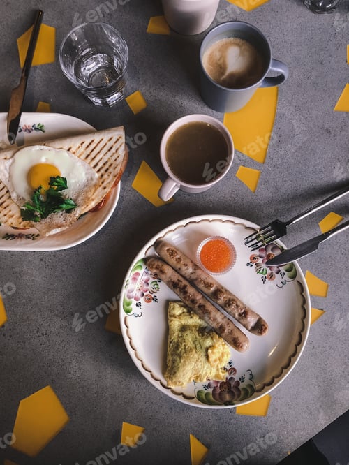 Preview: Top view of wholesome tasty breakfast for a couple.