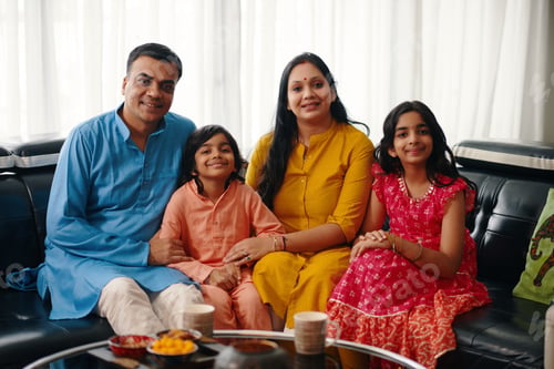 Preview: Happy Indian Family Sitting At Home