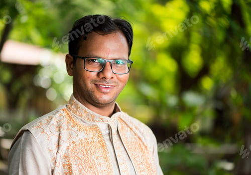 Preview: Portrait of happy indian man at outdoor