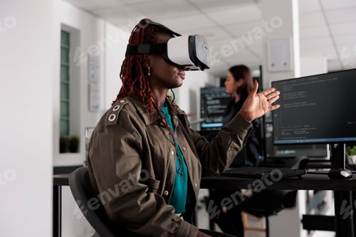 Preview: It programmer working with virtual reality headset to develop server app in it big data office