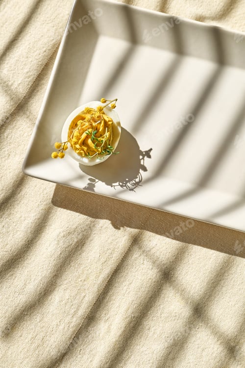 Preview: Stuffed easter eggs mimosa with egg yolk, turmeric, cream cheese and cress salad.