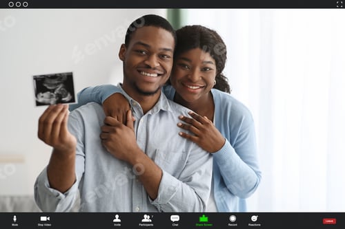 Preview: Pov screen of happy black couple showing baby sonogram