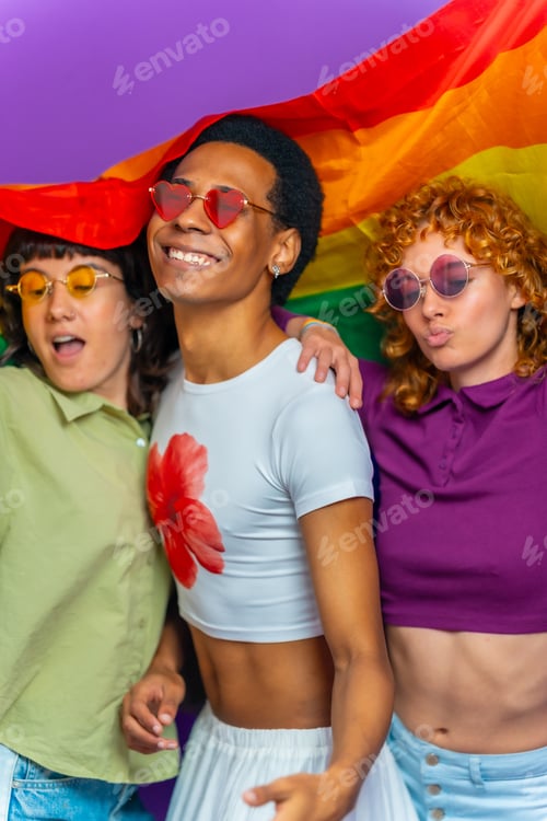 Preview: Multiracial friends dancing waving lgbt rainbow flag