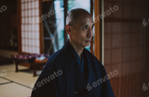 Preview: Japanese man meditating in his garden
