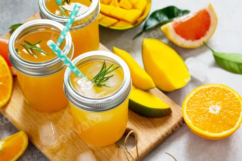 Preview: Multifruit drinks of citrus and mango with ice, smoothies.