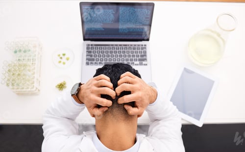Preview: Man, scientist and laptop with headache in stress, anxiety or mistake and mental health in biology