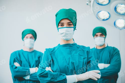 Preview: professional surgery team in the operating room, urgent surgery. Professional smart