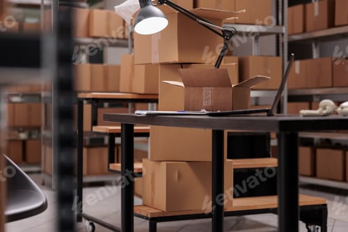 Preview: Empty warehouse equipped with tall shelves full with cardboard boxes ready for delivery