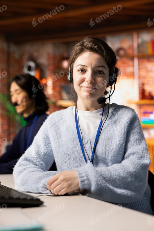 Preview: Close up of customer support worker wearing headset following call script
