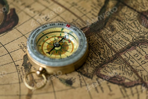 Preview: Old compass on vintage map