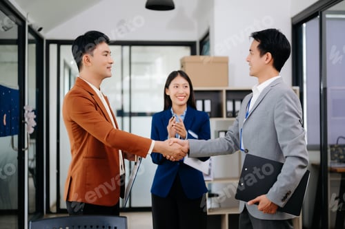 Preview: Two confident business man shaking hands during a meeting in the office, success, dealing, greeting
