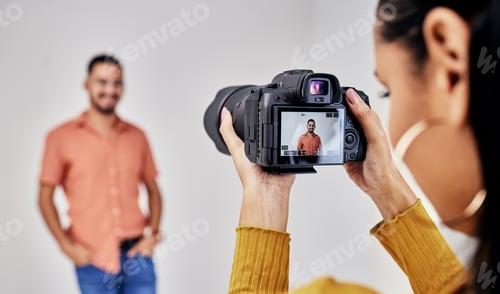 Preview: Woman, studio photography and camera with man, model and vision for fashion, magazine or designer.