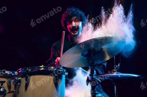 Preview: Drummer's rehearsing on drums before rock concert. Man recording music on drumset in studio