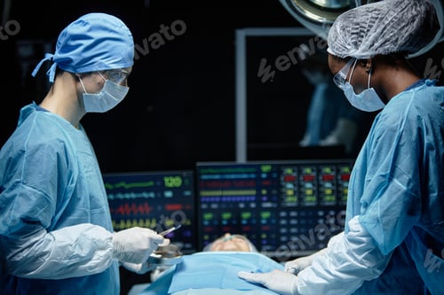 Preview: Surgeon in Operating Theater with Blue Light