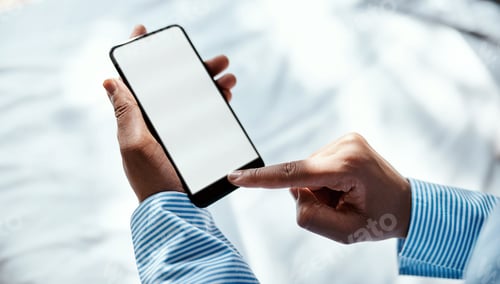 Preview: Cropped sot of an unrecognisable businesswoman using a smartphone