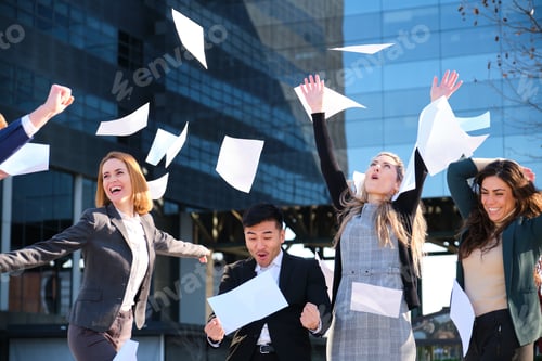 Preview: Businesspeople investors team throw papers up in the air celebrate bull market.