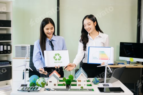 Preview: Business team people planning hand using laptop for working technology and business Net zero