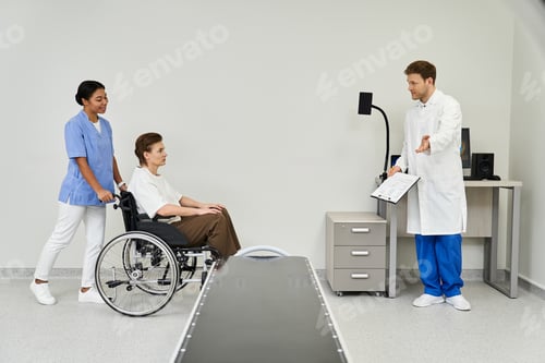 Preview: Care team prepares female patient for mri scan in modern healthcare setting