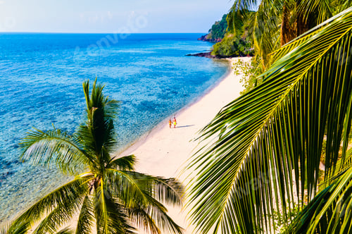 Preview: couple of men and woman on the beach of Koh kradan Island Southern Thailand