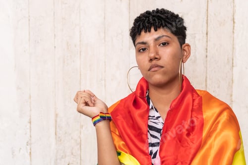 Preview: Young Adult Posing with Pride Flag Drape
