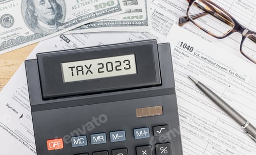 Preview: Calculator with TAX 2023 text on screen