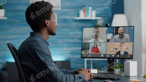 Preview: Selective focus on african american man on online conference video call