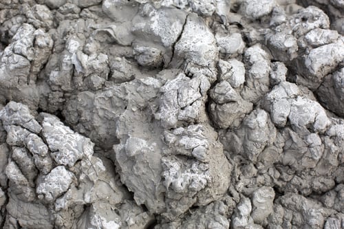 Preview: The texture of gray cracked earth, dried volcanic clay with cracks. Ultimate Gray