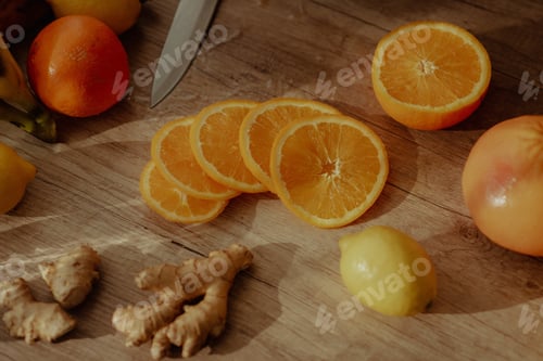Preview: Sliced orange and fruits on a cutting board