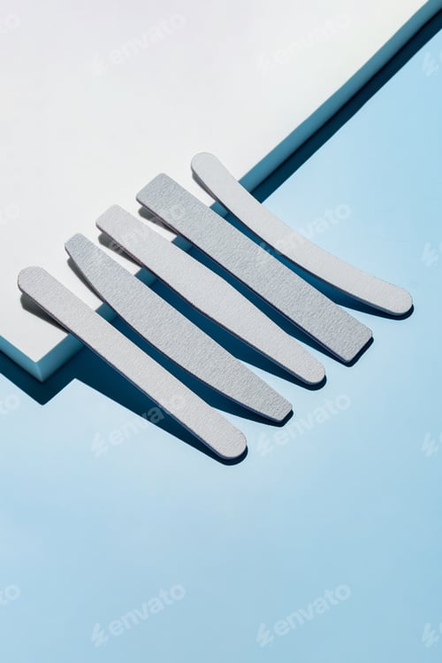 Preview: Gray emery board set. Woman's manicure accessory. Stylish branding shoot. Copy space for text