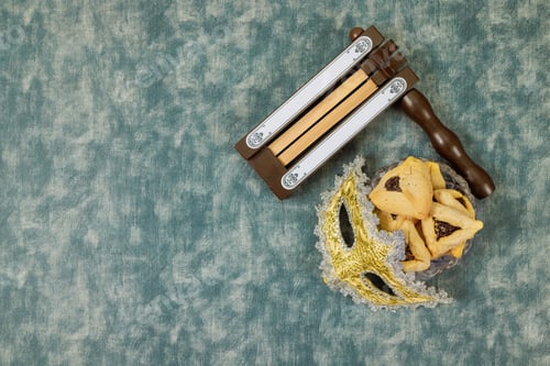 Preview: A Jewish holiday of Purim is celebrated with rattles, carnival masks, hamantaschen cookies, among