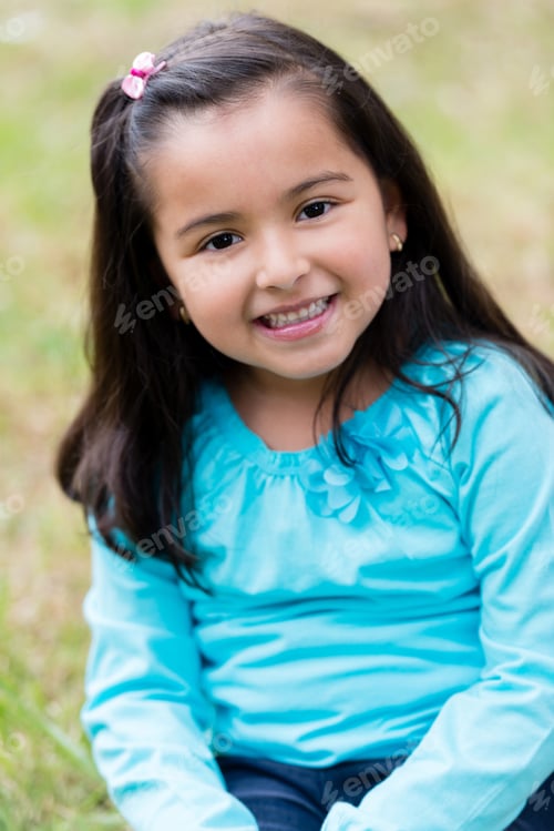 Preview: Happy Little Girl Smiling At The Park