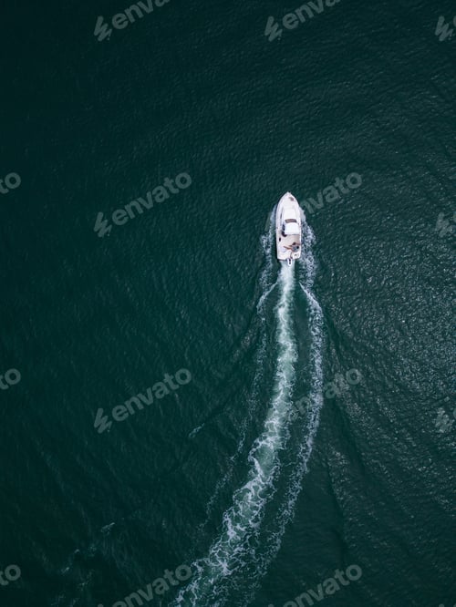 Preview: Aerial view of speed motor boat on open sea at summer day