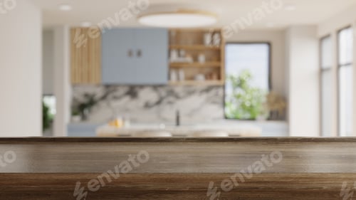 Preview: Wooden table top on blur kitchen room background,Modern kitchen room interior