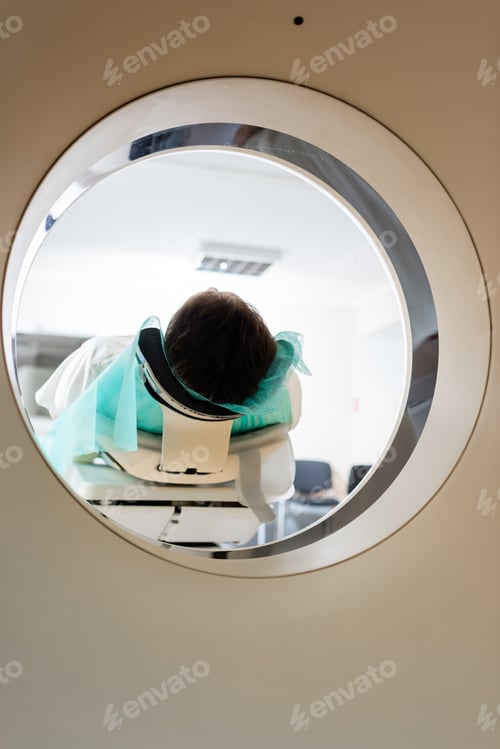 Preview: brunette man doing computed tomography in hospital