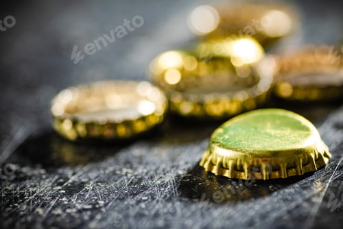 Preview: Several beer bottle caps.