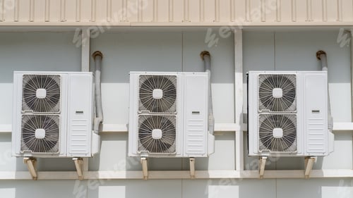 Preview: Air conditioners are mounted on a wall.